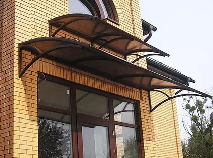 Кованые козырьки над дверью КД-05