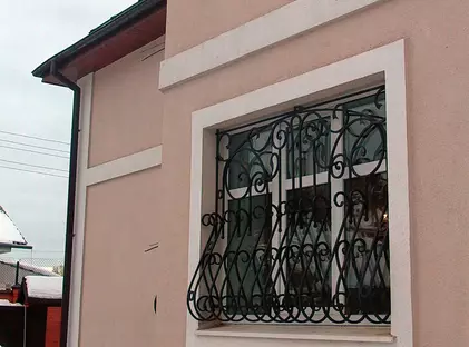 Кованые дутые решётки на окна ДРО-09